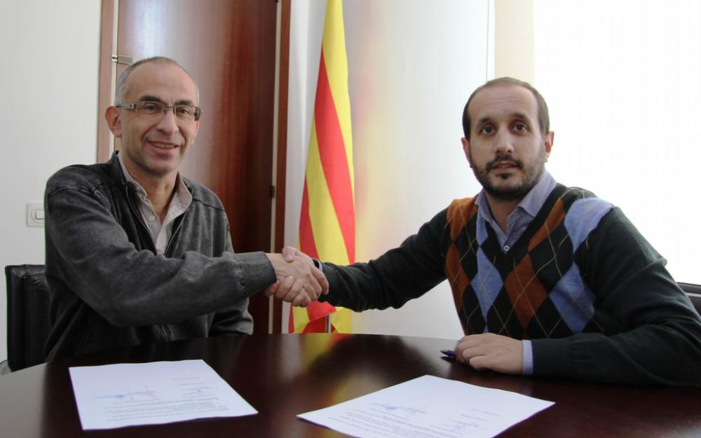 Signatura conveni Parròquia i Ajuntament