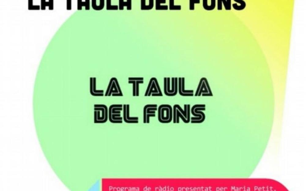 La taula del fons Escena i Llibres